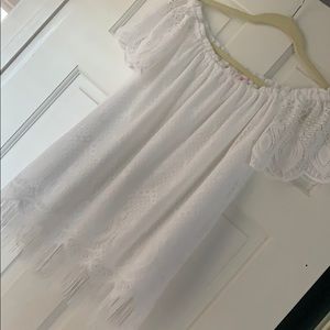White off the shoulder Lilly Pulitzer shirt.